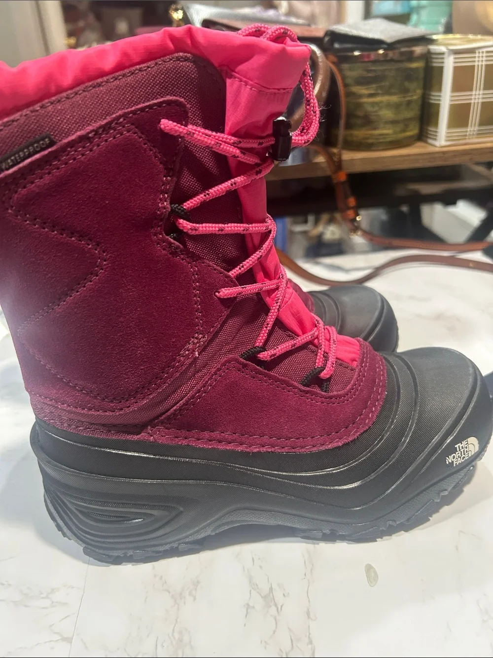 The North Face Kids Waterproof Snow Boots in Burgundy and Pink